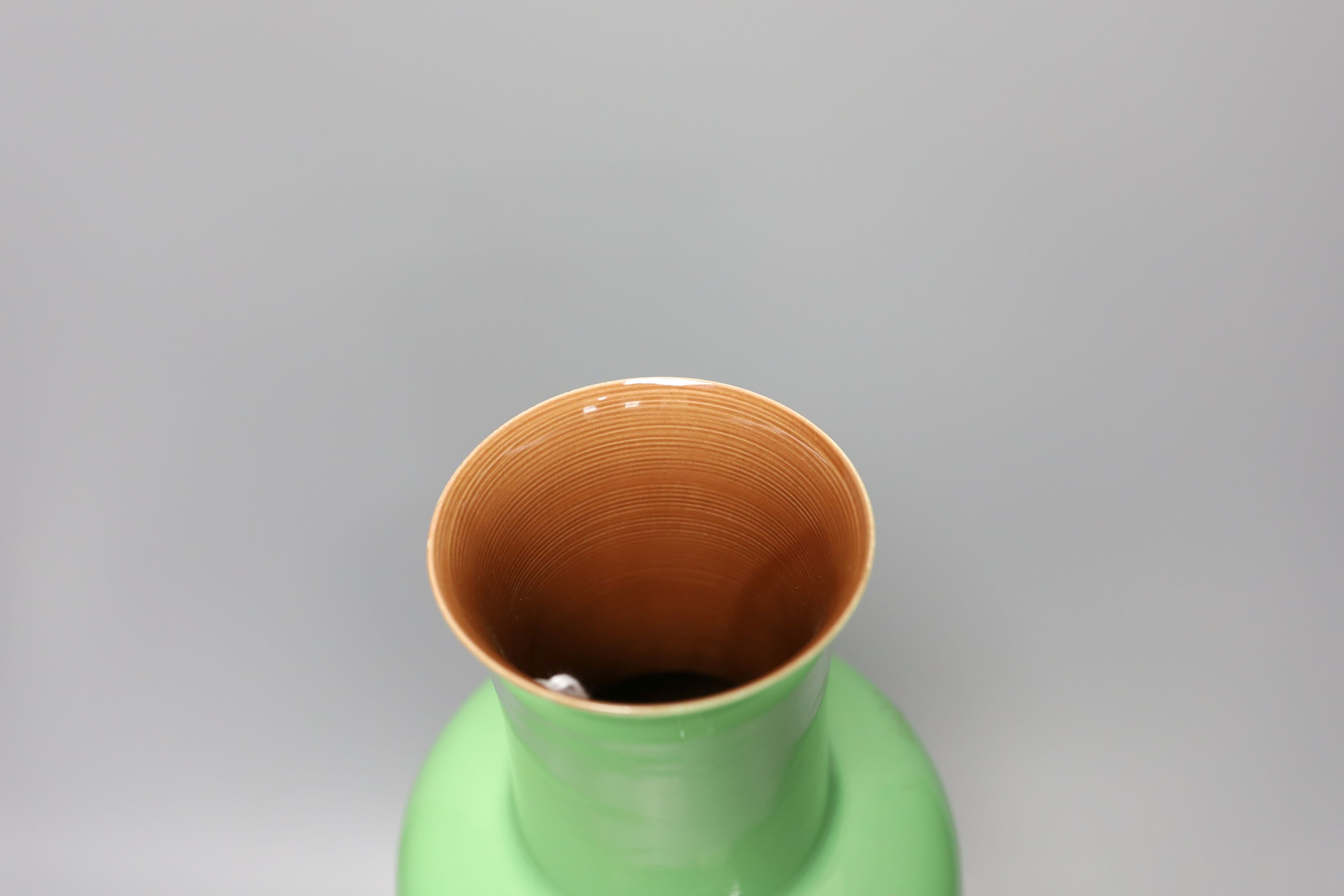 A Chinese green glazed baluster vase, designed by Bo Jia - 39cm tall